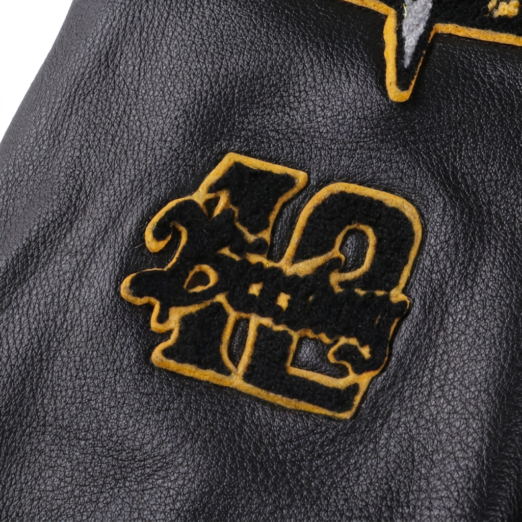 “CAPTURE THE FLAG” LEATHER STADIUM JACKET